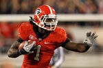 ATHENS, GA - NOVEMBER 12:  Isaiah Crowell #1 of the Georgia Bulldogs rushes upfield against the Auburn Tigers at Sanford Stadium on November 12, 2011 in Athens, Georgia.  (Photo by Kevin C. Cox/Getty Images)