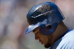 KANSAS CITY, MO - AUGUST 21: Melky Cabrera #53 of the Kansas City Royals walks to the dugout after pop flying out in the third inning at Kauffman Stadium on August 21, 2011 in Kansas City, Missouri. (Photo by Ed Zurga/Getty Images)