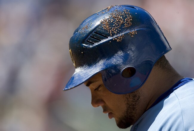 KANSAS CITY, MO - AUGUST 21: Melky Cabrera #53 of the Kansas City Royals walks to the dugout after pop flying out in the third inning at Kauffman Stadium on August 21, 2011 in Kansas City, Missouri. (Photo by Ed Zurga/Getty Images)