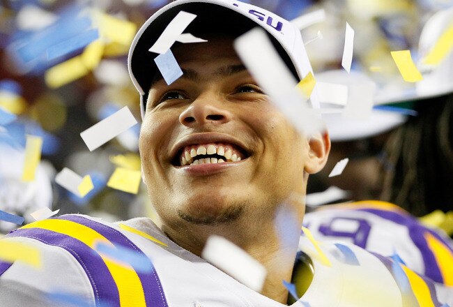 ATLANTA, GA - DECEMBER 03:  Tyrann Mathieu #7 of the LSU Tigers celebrates after earning the MVP trophy in their 42-10 win over the Georgia Bulldogs during the 2011 SEC Championship Game at Georgia Dome on December 3, 2011 in Atlanta, Georgia.  (Photo by Kevin C. Cox/Getty Images)