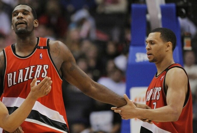 LOS ANGELES, CA - JANUARY 26: Greg Oden #52 of the Portland Trail Blazers celebrates with teammates Brandon Roy #7 and Jerryd Bayless #4 during their game against the Los Angeles Clippers at Staples Center January 26, 2009 in Los Angeles, California. NOTE TO USER: User expressly acknowledges and agrees that, by downloading and/or using this Photograph, user is consenting to the terms and conditions of the Getty Images License Agreement. (Photo by Kevork Djansezian/Getty Images)