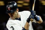 MINNEAPOLIS, MN - SEPTEMBER 7: Joe Mauer #7 of the Minnesota Twins is hit by a pitch from John Danks #50 of the Chicago White Sox in the third inning on September 7, 2011 at Target Field in Minneapolis, Minnesota. (Photo by Hannah Foslien/Getty Images)