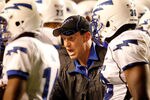 FORT WORTH, TX - OCTOBER 23:  Head coach Troy Calhoun of the Air Force Falcons leads his team on the field against the TCU Horned Frogs at Amon G. Carter Stadium on October 23, 2010 in Fort Worth, Texas.  (Photo by Tom Pennington/Getty Images)
