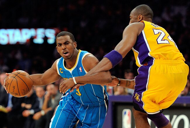 LOS ANGELES, CA - APRIL 20:  Chris Paul #3 of the New Orleans Hornets drives on Kobe Bryant #24 of the Los Angeles Lakers in the first quarter in Game Two of the Western Conference Quarterfinals in the 2011 NBA Playoffs on April 20, 2011 at Staples Center in Los Angeles, California. NOTE TO USER: User expressly acknowledges and agrees that, by downloading and or using this photograph, User is consenting to the terms and conditions of the Getty Images License Agreement.  (Photo by Kevork Djansezian/Getty Images)