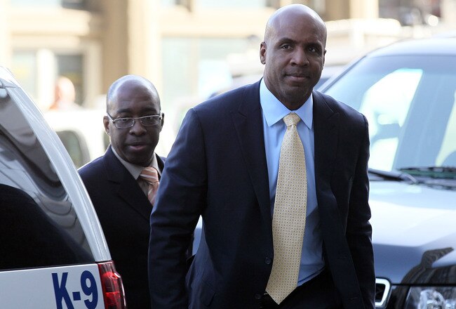 SAN FRANCISCO, CA - APRIL 12:  Former Major League Baseball player Barry Bonds (R) arrives at federal court on April 12, 2011 in San Francisco, California.  The jury is deliberating for the third day in the Barry Bonds perjury trial where the former baseball player is accused of lying to a grand jury about the use of performance enhancing drugs.  (Photo by Justin Sullivan/Getty Images)