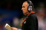 NEW ORLEANS - JANUARY 01:  Head coach June Jones of the Hawai'i Warriors coaches against the Georgia Bulldogs during the Allstate Sugar Bowl at the Louisiana Superdome on January 1, 2008 in New Orleans, Louisiana. Georgia won 41-10. (Photo by Matthew Stockman/Getty Images)