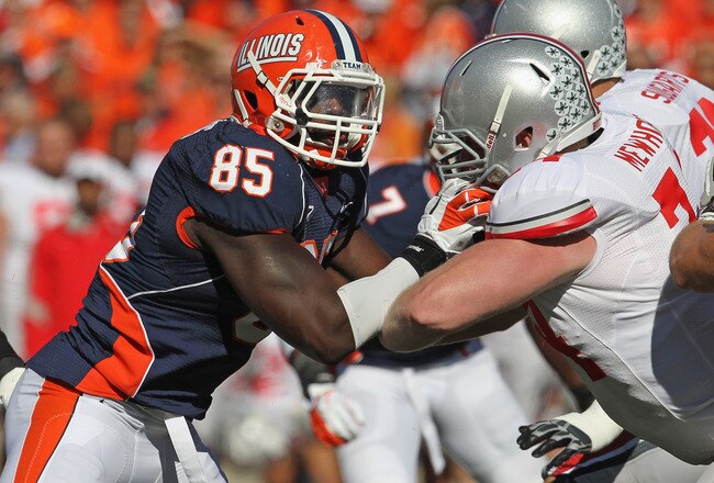 CHAMPAIGN, IL - OCTOBER 15:  Whitney Mercilus #85 of the Illinois Fighting Illini rushes against Jack Mewhort #74 of the Ohio State Buckeyes at Memorial Stadium on October 15, 2011 in Champaign, Illinois. Ohio State defeated Illinois 17-7.  (Photo by Jonathan Daniel/Getty Images)