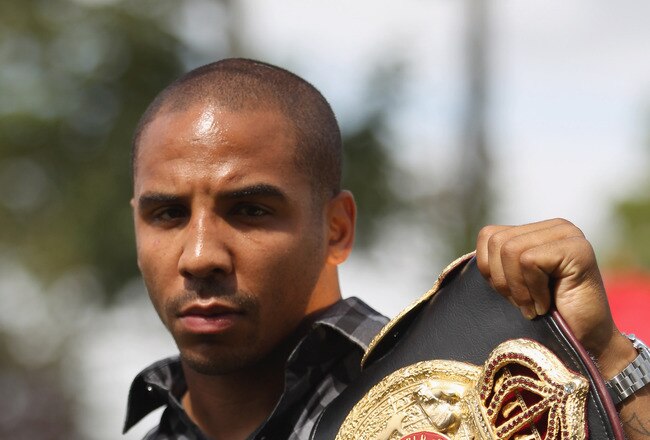 BRENTWOOD, ENGLAND - AUGUST 22:  Andre Ward of the USA poses with the WBA belt during the Carl Froch and Andre Ward Press Conference at Matchroom Sports Head Office on August 22, 2011 in Brentwood, England.  (Photo by Tom Shaw/Getty Images)