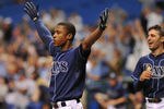 ST. PETERSBURG, FL - SEPTEMBER 07:  Outfielder B. J. Upton #2 of the Tampa Bay Rays celebrates after outfielder Desmond Jennings #8 of the Rays hits a 10th-inning, game-winning home run against the Texas Rangers September 7, 2011 at Tropicana Field in St. Petersburg, Florida.  The Rays won 5 - 4. (Photo by Al Messerschmidt/Getty Images)