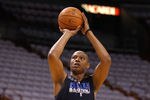 MIAMI, FL - JUNE 11:  Caron Butler of the Dallas Mavericks shoots around during practice prior to Game 6 of the 2011 NBA Finals against the Miami Heat at the American Airlines Arena on June 11, 2011 in miami, Florida. Game 6 will be played on June 12. NOTE TO USER: User expressly acknowledges and agrees that, by downloading and or using this photograph, User is consenting to the terms and conditions of the Getty Images License Agreement.  (Photo by Chris Chambers/Getty Images)