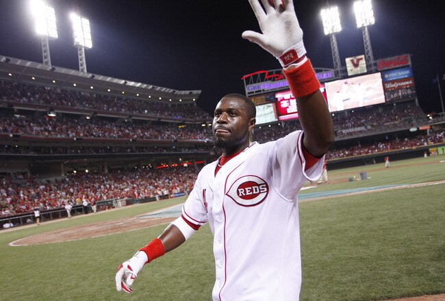 CINCINNATI, OH - JULY 15: Brandon Phillips #4 of the Cincinnati Reds waves to the crowd after hitting the game-winning home run in the bottom of the ninth inning against the St. Louis Cardinals at Great American Ball Park on July 15, 2011 in Cincinnati, Ohio. Cincinnati won 6-5. (Photo by Joe Robbins/Getty Images)
