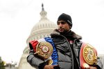 WASHINGTON, DC - DECEMBER 05:  Unified Light-Welterweight Champion of the World Amir Khan stands for a photo on the steps of the U.S. Capitol Building on December 5, 2011 in Washington, DC.  (Photo by Patrick McDermott/Getty Images)