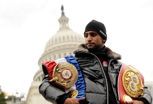 WASHINGTON, DC - DECEMBER 05:  Unified Light-Welterweight Champion of the World Amir Khan stands for a photo on the steps of the U.S. Capitol Building on December 5, 2011 in Washington, DC.  (Photo by Patrick McDermott/Getty Images)
