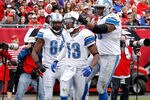 TAMPA, FL - DECEMBER 19:  Receiver Nate Burleson #13 of the Detroit Lions celebrates a touchdown against the Tampa Bay Buccaneers during the game at Raymond James Stadium on December 19, 2010 in Tampa, Florida.  (Photo by J. Meric/Getty Images)