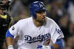 LOS ANGELES, CA - SEPTEMBER 16:  James Loney #7 of the Los Angeles Dodgers runs to first as he watches his pinch hit three run home run in the sixth inning against the Pittsburgh Pirates on September 16, 2011 at Dodger Stadium in Los Angeles, California.  (Photo by Stephen Dunn/Getty Images)