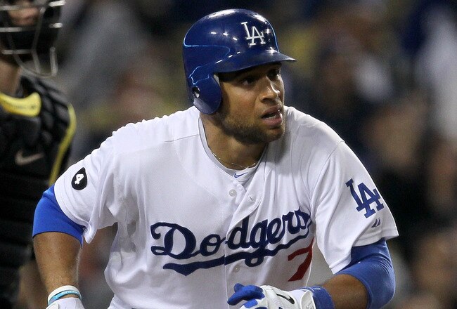 LOS ANGELES, CA - SEPTEMBER 16:  James Loney #7 of the Los Angeles Dodgers runs to first as he watches his pinch hit three run home run in the sixth inning against the Pittsburgh Pirates on September 16, 2011 at Dodger Stadium in Los Angeles, California.  (Photo by Stephen Dunn/Getty Images)