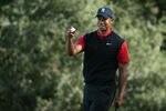 THOUSAND OAKS, CA - DECEMBER 04:  Tiger Woods smiles after his birdie putt on the 10th hole during the final round of the Chevron World Challenge at Sherwood Country Club on December 4, 2011 in Thousand Oaks, California.  (Photo by Robert Meggers/Getty Images)