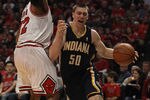 CHICAGO, IL - APRIL 16: Tyler Hansbrough #50 of the Indiana Pacers drives around Taj Gibson #22 of the Chicago Bulls in Game One of the Eastern Conference Quarterfinals in the 2011 NBA Playoffs at the United Center on April 16, 2011 in Chicago, Illinois. The Bulls defeated the Pacers 104-99. NOTE TO USER: User expressly acknowledges and agrees that, by downloading and/or using this photograph, User is consenting to the terms and conditions of the Getty Images License Agreement.  (Photo by Jonathan Daniel/Getty Images)