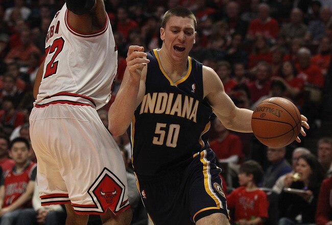 CHICAGO, IL - APRIL 16: Tyler Hansbrough #50 of the Indiana Pacers drives around Taj Gibson #22 of the Chicago Bulls in Game One of the Eastern Conference Quarterfinals in the 2011 NBA Playoffs at the United Center on April 16, 2011 in Chicago, Illinois. The Bulls defeated the Pacers 104-99. NOTE TO USER: User expressly acknowledges and agrees that, by downloading and/or using this photograph, User is consenting to the terms and conditions of the Getty Images License Agreement.  (Photo by Jonathan Daniel/Getty Images)