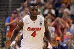 TAMPA, FL - MARCH 19:  Patric Young #4 of the Florida Gators reacts against the UCLA Bruins during the third round of the 2011 NCAA men's basketball tournament at St. Pete Times Forum on March 19, 2011 in Tampa, Florida.  (Photo by Mike Ehrmann/Getty Images)