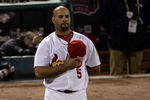 ST LOUIS, MO - OCTOBER 28:  Albert Pujols #5 of the St. Louis Cardinals stands for the national anthem prior to Game Seven of the MLB World Series against the Texas Rangers at Busch Stadium on October 28, 2011 in St Louis, Missouri.  (Photo by Rob Carr/Getty Images)