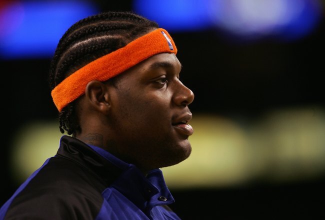BOSTON - NOVEMBER 24:  Eddy Curry #34 of the New York Knicks looks on during a game against the Boston Celtics at the TD Banknorth Garden on November 24, 2006 in Boston, Massachusetts.  The New York Knicks defeated the Boston Celtics 101-77. NOTE TO USER: User expressly acknowledges and agrees that, by downloading and or using this photograph, User is consenting to the terms and conditions of the Getty Images License Agreement. (Photo by Elsa/Getty Images)