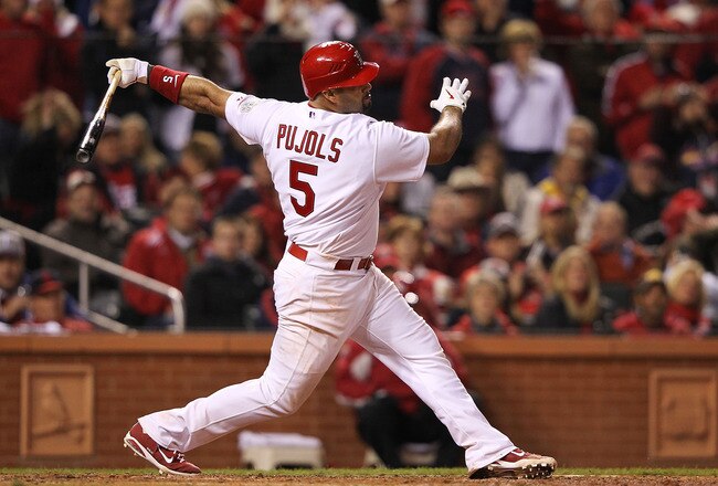 ST LOUIS, MO - OCTOBER 28:  Albert Pujols #5 of the St. Louis Cardinals strikes out in the seventh inning during Game Seven of the MLB World Series against the Texas Rangers at Busch Stadium on October 28, 2011 in St Louis, Missouri.  (Photo by Jamie Squire/Getty Images)
