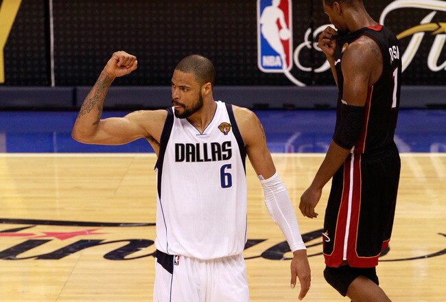 DALLAS, TX - JUNE 09:  Tyson Chandler #6 of the Dallas Mavericks celebrates the Mavericks 112-103 win as Chris Bosh #1 of the Miami Heat in Game Five of the 2011 NBA Finals at American Airlines Center on June 9, 2011 in Dallas, Texas.  NOTE TO USER: User expressly acknowledges and agrees that, by downloading and/or using this Photograph, user is consenting to the terms and conditions of the Getty Images License Agreement.  (Photo by Tom Pennington/Getty Images)