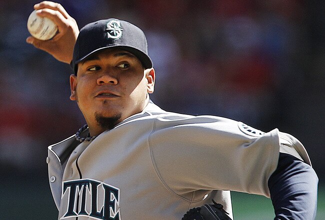 ARLINGTON, TX - SEPTEMBER 24: Starting pitcher Felix Hernandez #34 of the Seattle Mariners throws a pitch during the first inning of a baseball game against the Texas Rangers at Rangers Ballpark in Arlington on September 24, 2011 in Arlington, Texas. (Photo by Brandon Wade/Getty Images)