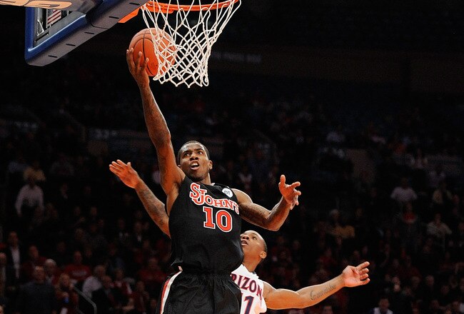 NEW YORK, NY - NOVEMBER 17:  Nurideen Lindsey #10 of the St. John's Red Storm drives to the basket against Josiah Turner #11 of the Arizona Wildcats during the 2K Sports Classic Benefiting Coaches Vs Cancer at Madison Square Garden on November 17, 2011 in New York City.  (Photo by Patrick McDermott/Getty Images)