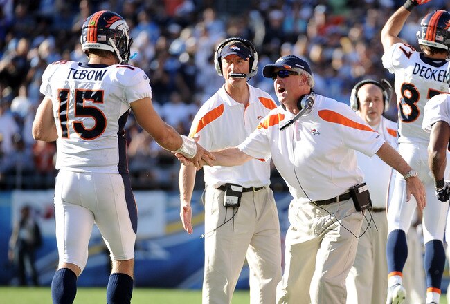 SAN DIEGO, CA - NOVEMBER 27:  Head coach John Fox of the Denver Broncos celebrates a touchdown with Tim Tebow #15 to trail 10-7 to the San Diego Chargers during the second quarter at Qualcomm Stadium on November 27, 2011 in San Diego, California.  (Photo by Harry How/Getty Images)