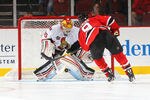NEWARK, NJ - DECEMBER 08:  Zach Parise #9 of the New Jersey Devils scores a shootout goal against Alex Auld #35 of the Ottawa Senators during their game on December 8, 2011 at The Prudential Center in Newark, New Jersey  (Photo by Al Bello/Getty Images)