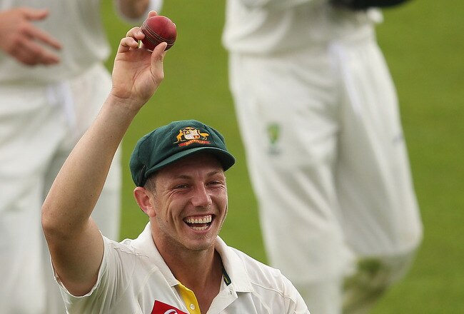 HOBART, AUSTRALIA - DECEMBER 09:  James Pattinson of Australia raises the ball to the crowd as he leaves the field after taking five wickets during day one of the Second Test match between Australia and New Zealand at Bellerive Oval on December 9, 2011 in Hobart, Australia.  (Photo by Quinn Rooney/Getty Images)