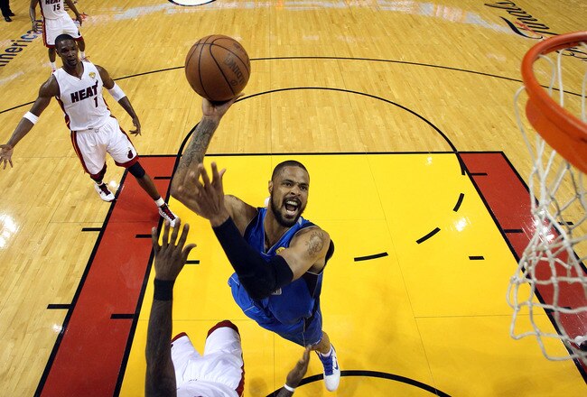 MIAMI, FL - JUNE 12:  Tyson Chandler #6 of the Dallas Mavericks attempts a shot againsbt LeBron James #6 of the Miami Heat in Game Six of the 2011 NBA Finals at American Airlines Arena on June 12, 2011 in Miami, Florida. The Mavericks won 105-95. NOTE TO USER: User expressly acknowledges and agrees that, by downloading and/or using this Photograph, user is consenting to the terms and conditions of the Getty Images License Agreement.  (Photo by Ronald Martinez/Getty Images)