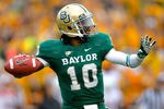 WACO, TX - DECEMBER 03:  Robert Griffin III #10 of the Baylor Bears looks to pass during a game against the Texas Longhorns at Floyd Casey Stadium on December 3, 2011 in Waco, Texas.  (Photo by Sarah Glenn/Getty Images)