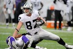 MINNEAPOLIS, MN - NOVEMBER 20: Kevin Boss #87 of the Oakland Raiders is taken down by Tyrell Johnson #25 of the Minnesota Vikings in the first quarter on November 20, 2011 at Hubert H. Humphrey Metrodome in Minneapolis, Minnesota. (Photo by Hannah Foslien/Getty Images)