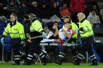 BASEL, SWITZERLAND - DECEMBER 07: Nemanja Vidic of Manchester United is strecthered off injured during the UEFA Champions League Group C match between FC Basel 1893 and Manchester United at St. Jakob-Park on December 7, 2011 in Basel, Switzerland.  (Photo by Jamie McDonald/Getty Images)