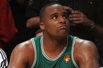 LOS ANGELES, CA - JUNE 03:  Glen Davis #11 of the Boston Celtics looks on form the bench dejected late in the fourth quarter against the Los Angeles Lakers in Game One of the 2010 NBA Finals at Staples Center on June 3, 2010 in Los Angeles, California.  NOTE TO USER: User expressly acknowledges and agrees that, by downloading and/or using this Photograph, user is consenting to the terms and conditions of the Getty Images License Agreement  (Photo by Lisa Blumenfeld/Getty Images)