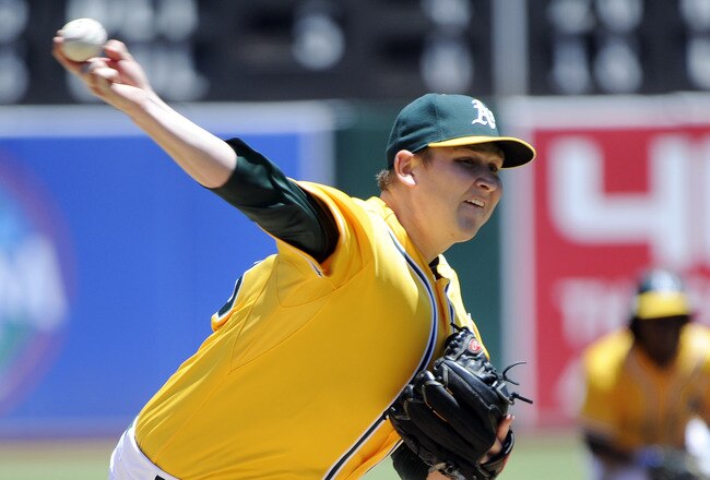 OAKLAND, CA -  JUNE 19: Trevor Cahill #53 of the Oakland Athletics pitches against the San Francisco Giants in the second inning during a MLB baseball game June 19, 2011 at the Oakland-Alameda County Coliseum in Oakland, California. (Photo by Thearon W. Henderson/Getty Images)