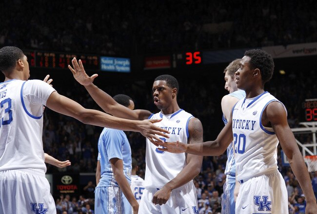 LEXINGTON, KY - DECEMBER 3: Doron Lamb #20 and Terrence Jones #3 of the Kentucky Wildcats celebrate against the North Carolina Tar Heels during their game at Rupp Arena on December 3, 2011 in Lexington, Kentucky. Kentucky won 73-72. (Photo by Joe Robbins/Getty Images)