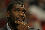 CHICAGO - NOVEMBER 01: Greg Oden #52 of the Portland Trail Blazers watches from the bench as his teammates take on the Chicago Bulls at the United Center on November 1, 2010 in Chicago, Illinois. The Bulls defeated the Trail Blazers 110-98. NOTE TO USER: User expressly acknowledges and agrees that, by downloading and/or using this Photograph, User is consenting to the terms and conditions of the Getty Images License Agreement. (Photo by Jonathan Daniel/Getty Images)