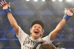 SAN JOSE, CA - AUGUST 15:  Cris Cyborg celebrates after defeating Gina Carano during their Middleweight  Championship Title fight at Stikeforce: Carano vs. Cyborg on August 15, 2009 in San Jose, California.  (Photo by Jon Kopaloff/Getty Images)