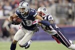 FOXBORO, MA - OCTOBER 16:  Miles Austin #19 of the Dallas Cowboys carries the ball as  Kyle Arrington #24 of the New England Patriots defends on October 16, 2011 at Gillette Stadium in Foxboro, Massachusetts. The New England Patriots defeated the Dallas Cowboys 20-16.  (Photo by Elsa/Getty Images)