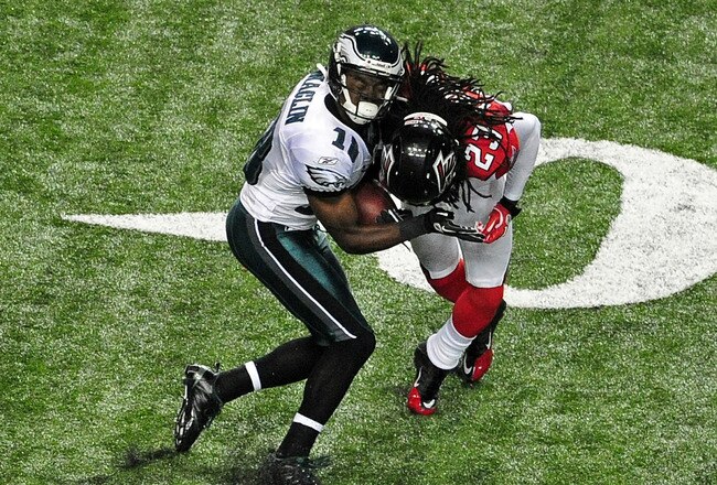 ATLANTA - SEPTEMBER 18: Jeremy Maclin #18 of the Philadelphia Eagles is tackled by Dunta Robinson #23 of the Atlanta Falcons at the Georgia Dome on September 18, 2011 in Atlanta, Georgia. Robinson would be penalized for leading with his helmet. (Photo by Scott Cunningham/Getty Images)