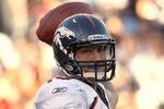 SAN DIEGO, CA - NOVEMBER 27:  Quarterback Tim Tebow #15 of the Denver Broncos throws the ball against the San Diego Chargers during the Broncos 16-13 overtime win in their NFL Game on November 27, 2011 at Qualcomm Stadium in San Diego, California  (Photo by Donald Miralle/Getty Images)