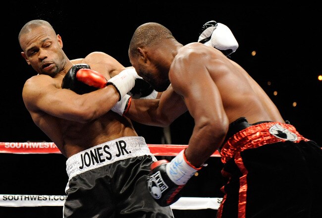 LAS VEGAS - APRIL 03:  Roy Jones Jr. (L) and Bernard Hopkins trade blows during the second round of their light heavyweight bout at the Mandalay Bay Events Center April 3, 2010 in Las Vegas, Nevada. Hopkins won by unanimous decision.  (Photo by Ethan Miller/Getty Images)