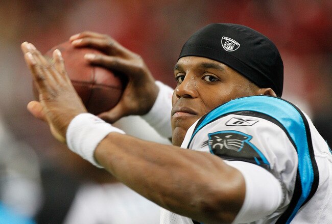 ATLANTA, GA - OCTOBER 16:  Cam Newton #1 of the Carolina Panthers warms up on the sidelines in the last few minutes of the game against the Atlanta Falcons at Georgia Dome on October 16, 2011 in Atlanta, Georgia.  (Photo by Kevin C. Cox/Getty Images)