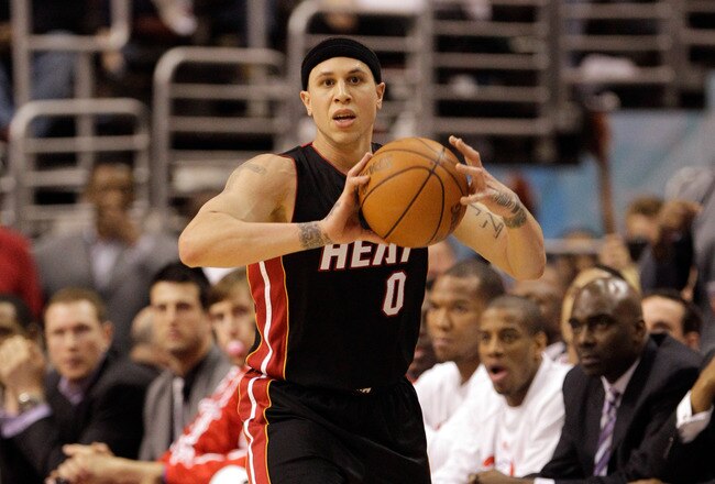 PHILADELPHIA, PA - APRIL 21: Mike Bibby #0 of the Miami Heat in action against the Philadelphia 76ers in Game Three of the Eastern Conference Quarterfinals during the 2011 NBA Playoffs at Wells Fargo Center on April 21, 2011 in Philadelphia, Pennsylvania.NOTE TO USER: User expressly acknowledges and agrees that, by downloading and/or using this Photograph, User is consenting to the terms and conditions of the Getty Images License Agreement.  (Photo by Rob Carr/Getty Images)