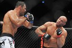 PORTLAND, OR - AUGUST 29:  UFC fighter Antonio Nogueira (L) battles UFC fighter Randy Couture (R) during their Heavyweight bout at UFC 102:  Couture vs. Nogueira at the Rose Garden Arena on August 29, 2009 in Portland, Oregon.  (Photo by Jon Kopaloff/Getty Images)