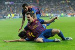 MADRID, SPAIN - DECEMBER 10:  Xavi Hernandez of Barcelona celebrates with Cesc Fabregas (R) after Barcelona scoring Barcelona's 2nd goal during the La Liga match between Real Madrid and Barcelona at Estadio Santiago Bernabeu on December 10, 2011 in Madrid, Spain.  (Photo by Denis Doyle/Getty Images)
